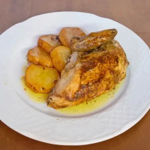 ¼ Pollastre amb patates panadera